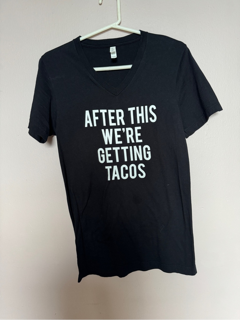 Black V-Neck Tee with "After This We're Getting Tacos" Graphic